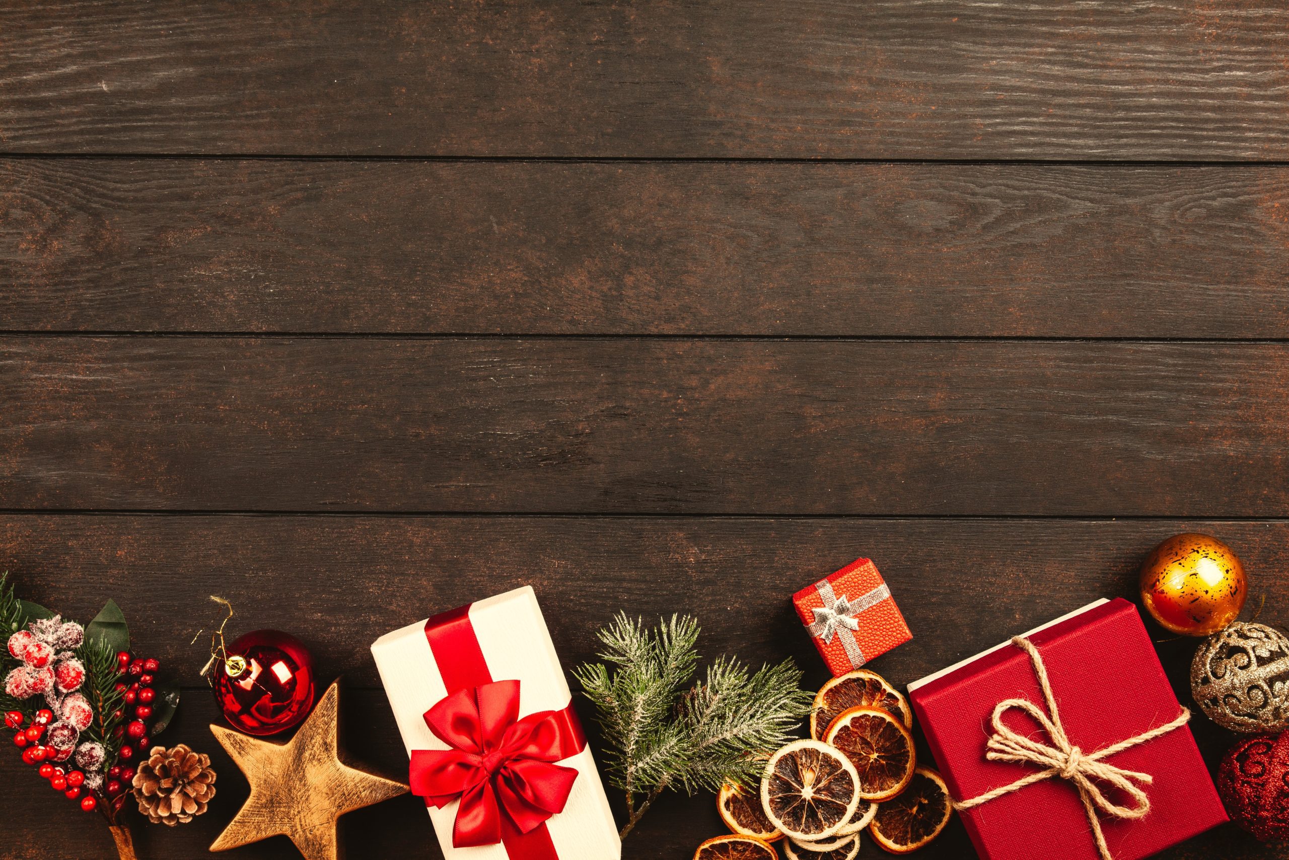 Christmas by Photo by George Dolgikh: https://www.pexels.com/photo/christmas-gifts-on-brown-parquet-floor-1303086/